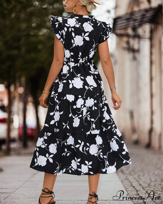 Floral dress with ruffled sleeves