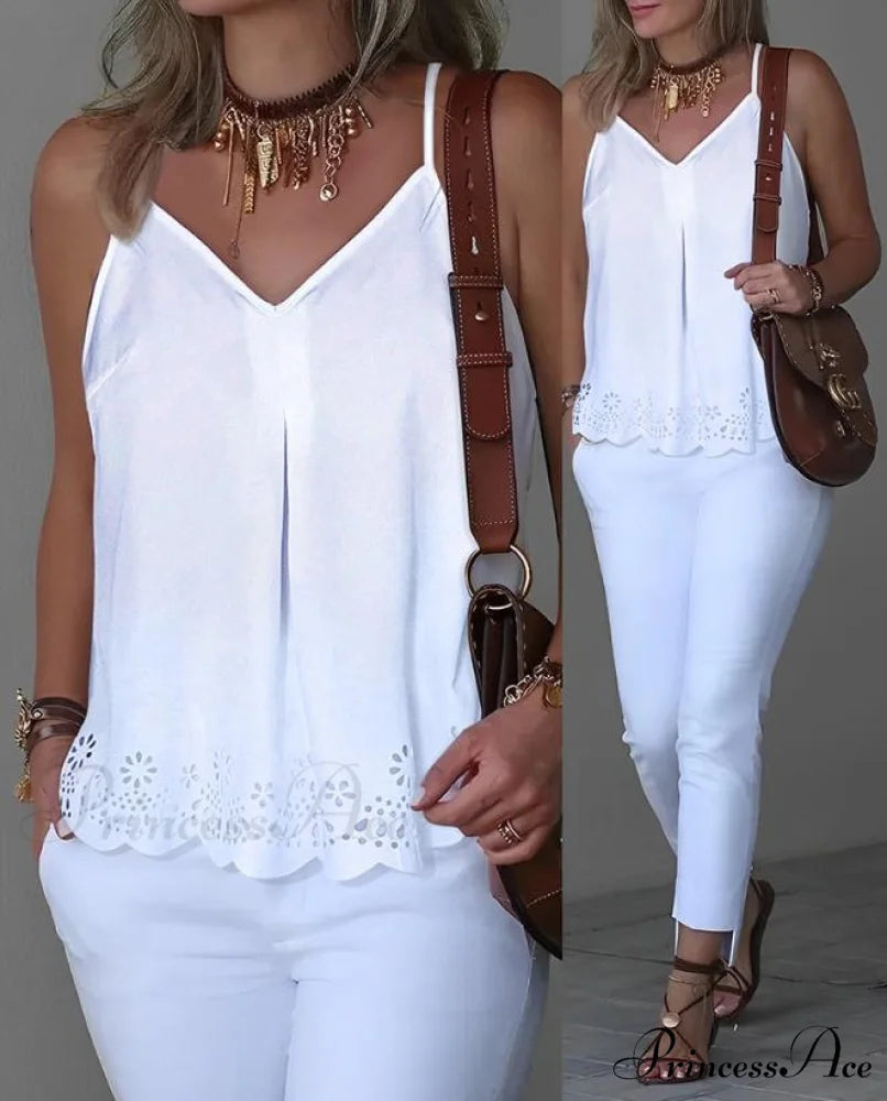 ALSU Women’s Top Input: BLACK JEANS Output: Black Denim Jeans Input: BLUE DRESS Output: Blue Midi Dress Input: WHITE