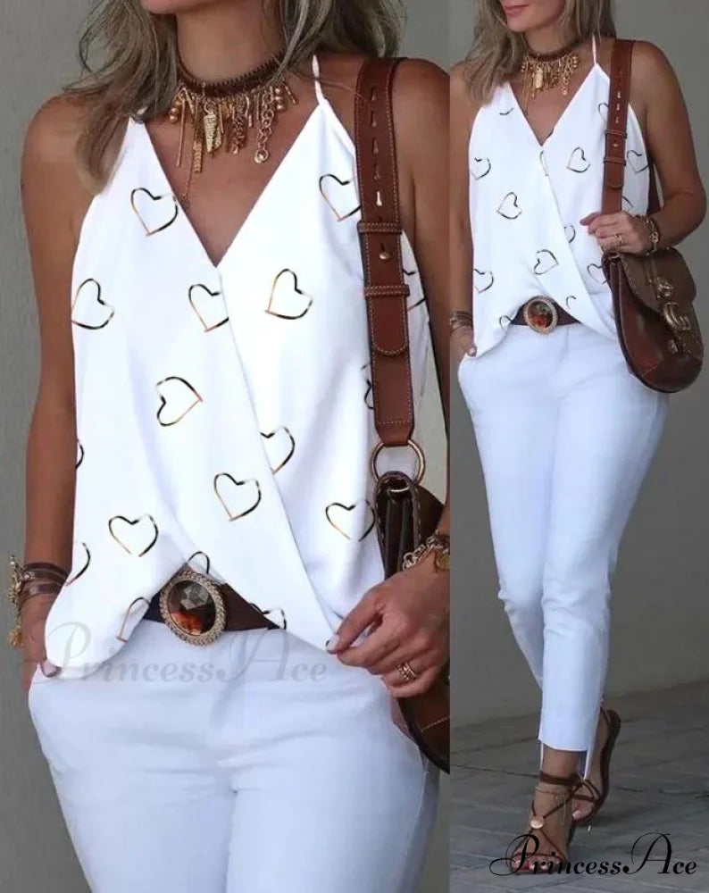 ALSU Women’s Top Input: BLACK JEANS Output: Black Denim Jeans Input: BLUE DRESS Output: Blue Midi Dress Input: WHITE