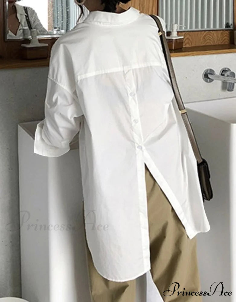 CHERYL ASYMMETRICAL TOP