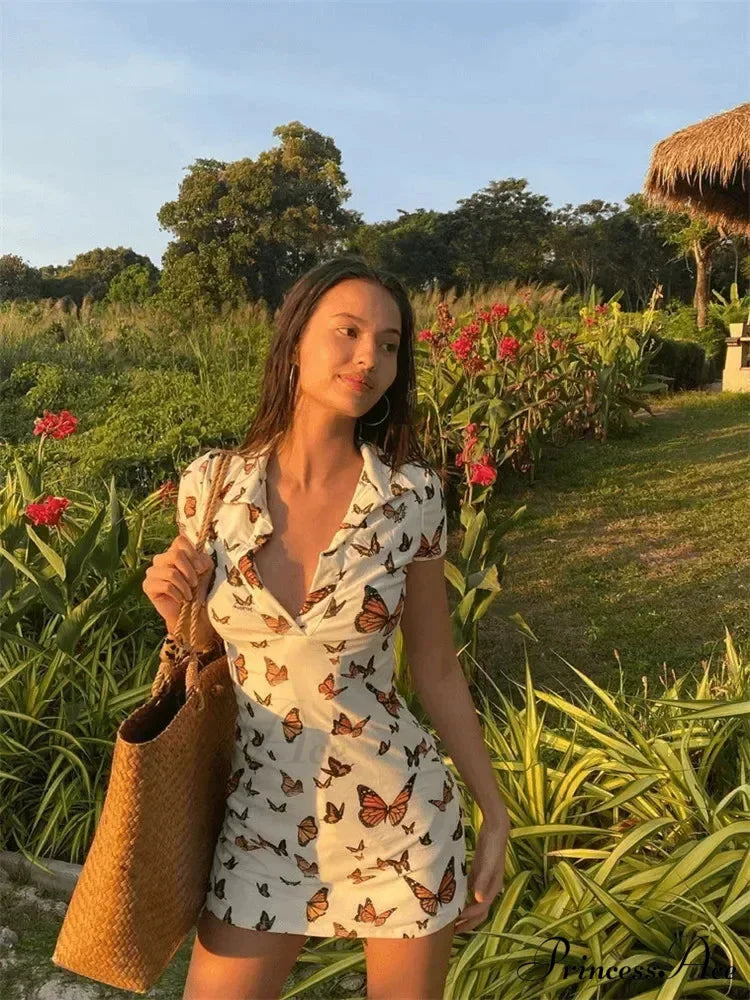 Deep-Neck Sewn Pattern Mini Dress minidress-250223