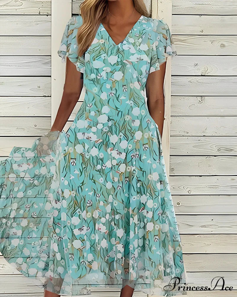Fitted short-sleeved dress with floral print Green / S