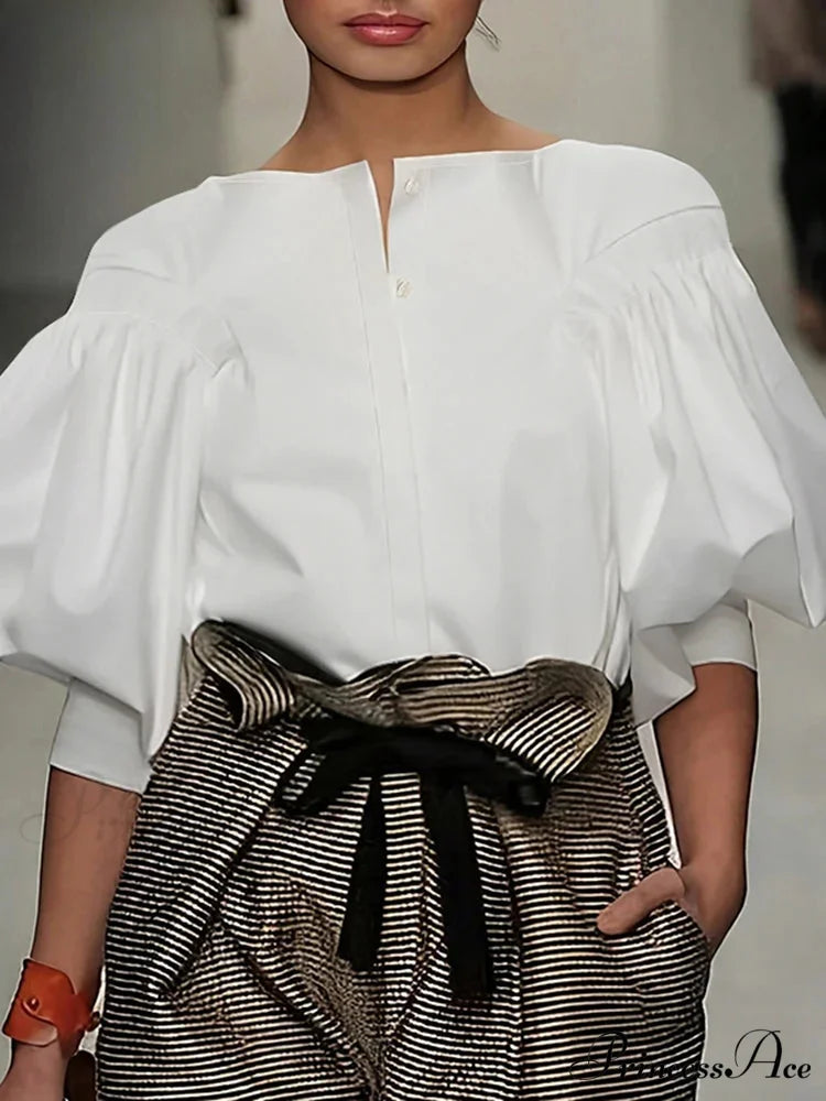 Lantern Quarter Sleeve Button Round Neck Blouse Modified Title: Lantern One-fourth Sleeve Button Circular Neck Blouse