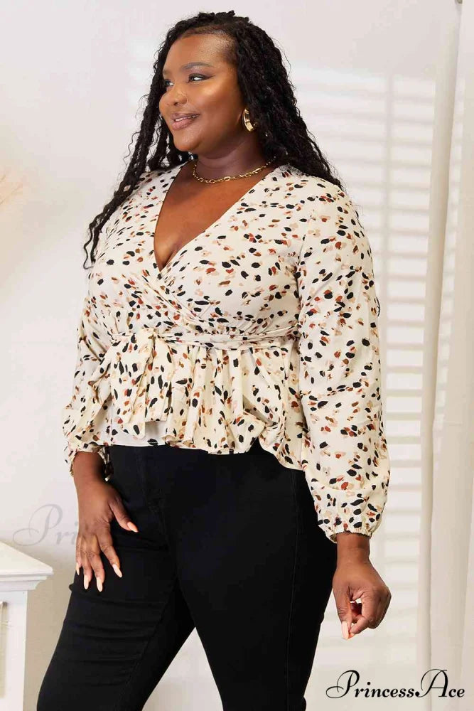 Peplum Plunge Patterned Tied Blouse