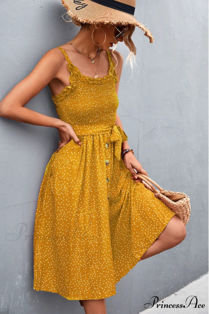 Polka-dot sling dress