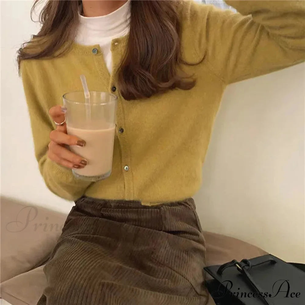 Single Breasted Solid Round Neck Knitted Cardigan Modified Title: One Buttoned Plain Circular Neck Knitted Cardigan