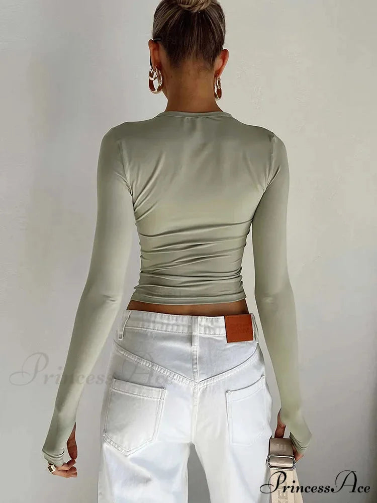 Stylish Crew Neck Trim Fit Extended Sleeve Knit Top with Thumb Holes knittop-250126