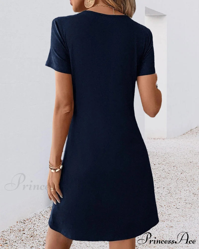 V Neck Dress with Twist Front Input: High Waisted Skinny Jeans Output: High Waisted Skinny Denim Pants Input: Floral